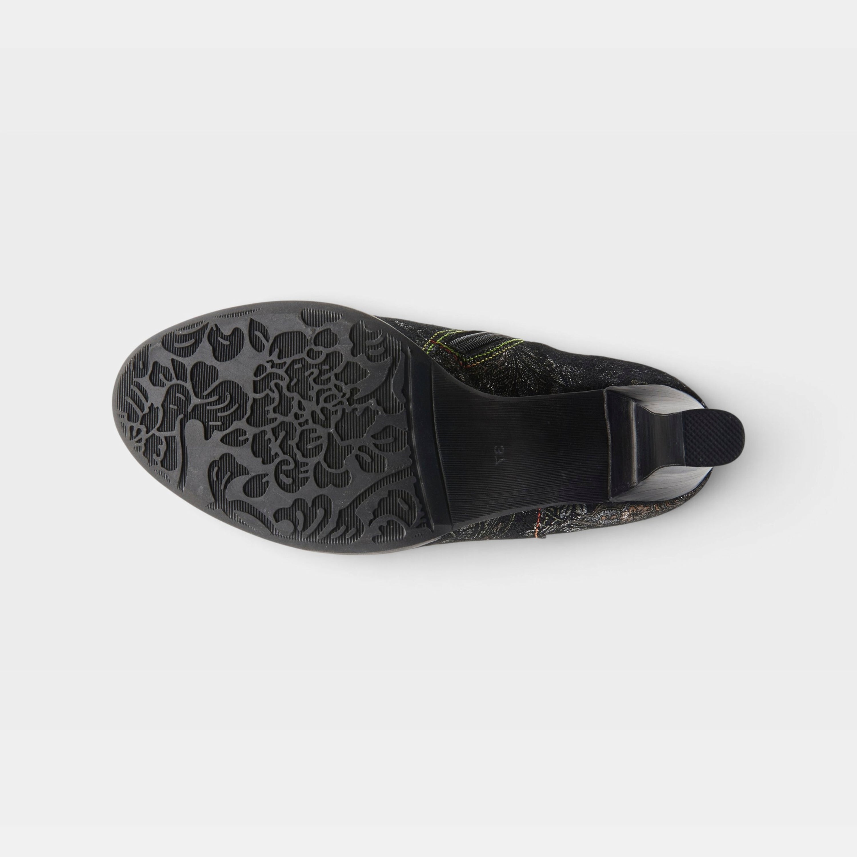 L'Artiste Smokinhot heeled booties in Black Multi, outsole view
