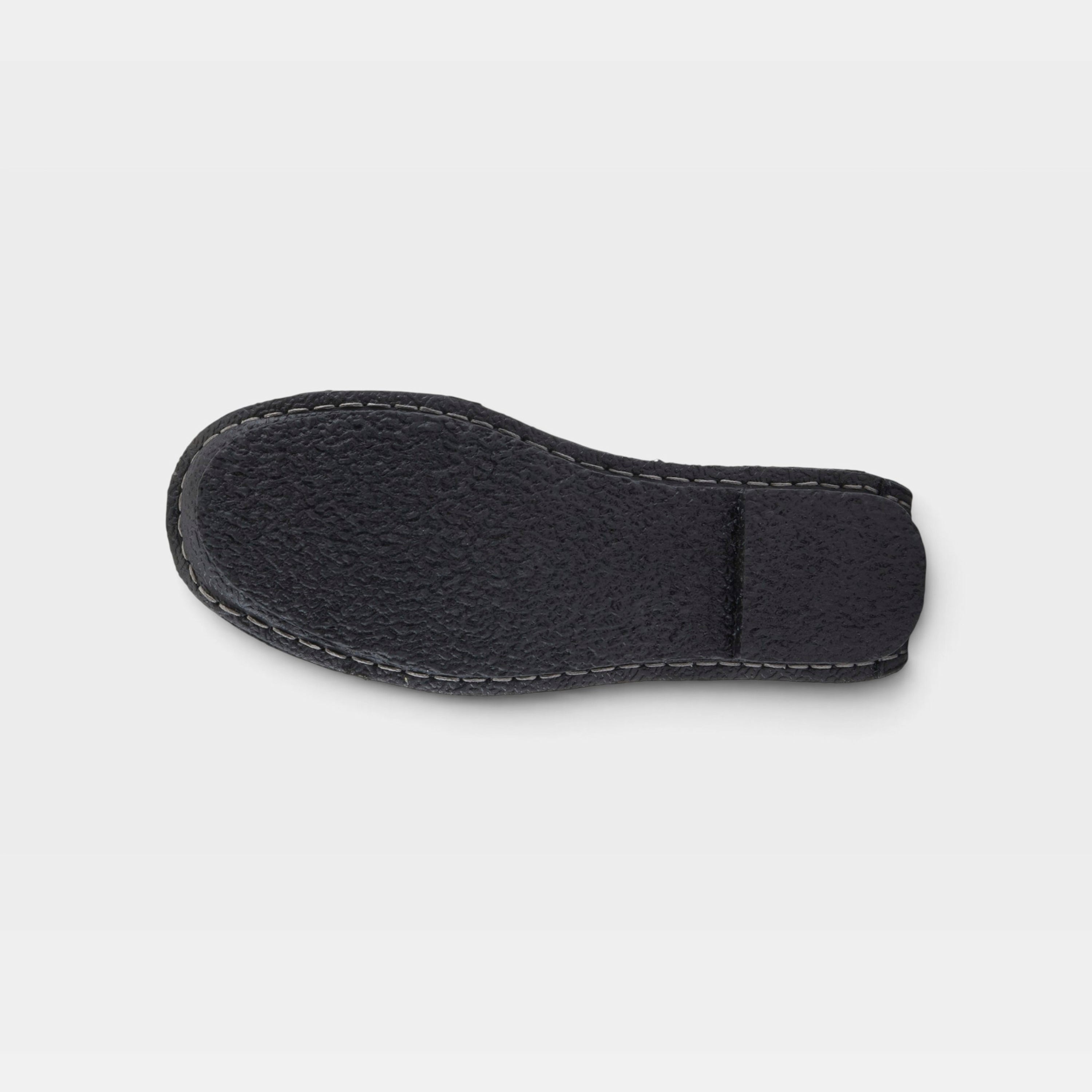 L'Artiste Dezi slip-on shoes in Black, outsole view