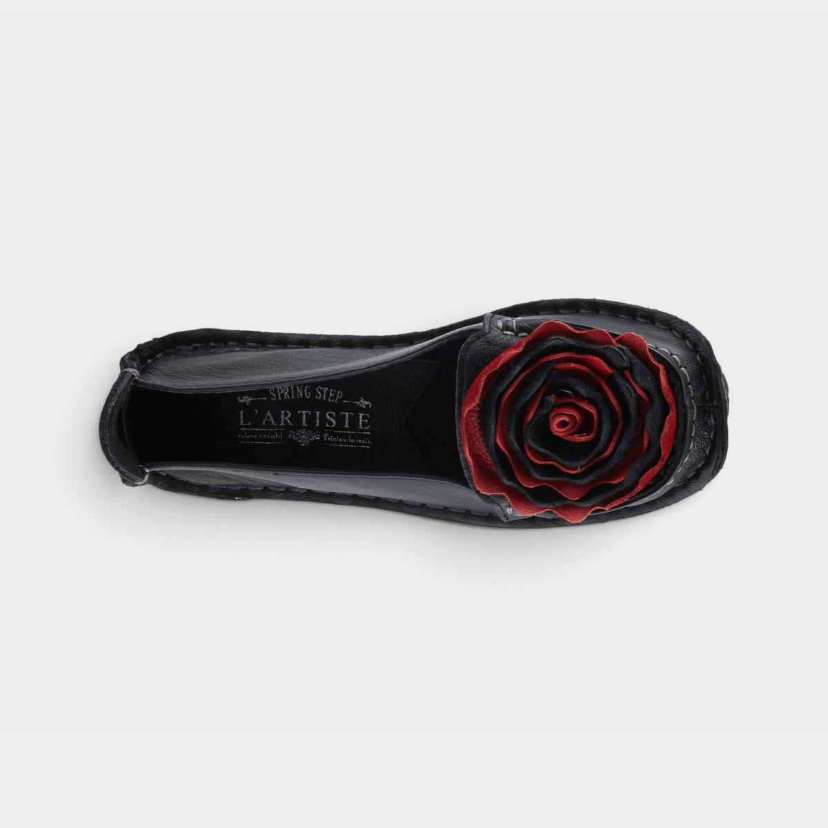 L'Artiste Dezi slip-on shoes in Black Multi, top view