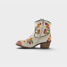 L'Artiste Galop boot in White, side view