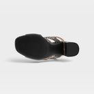 L'Artiste Pinwheel sandals in Black, outsole view