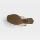 L'Artiste Pinwheel sandals in Off White, outsole view